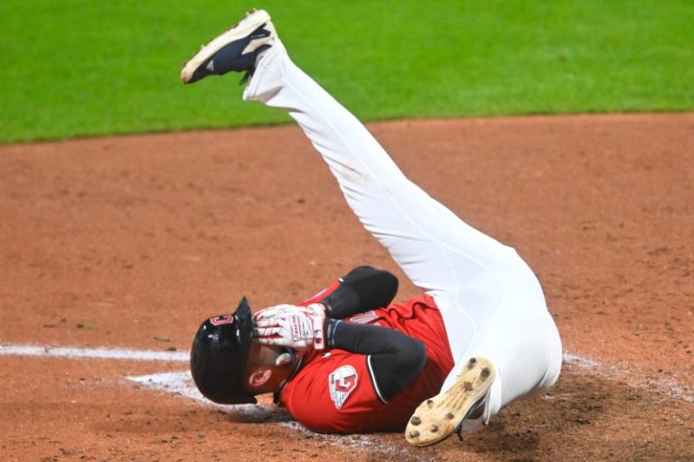 Guardians player carted off field after taking pitch to the face